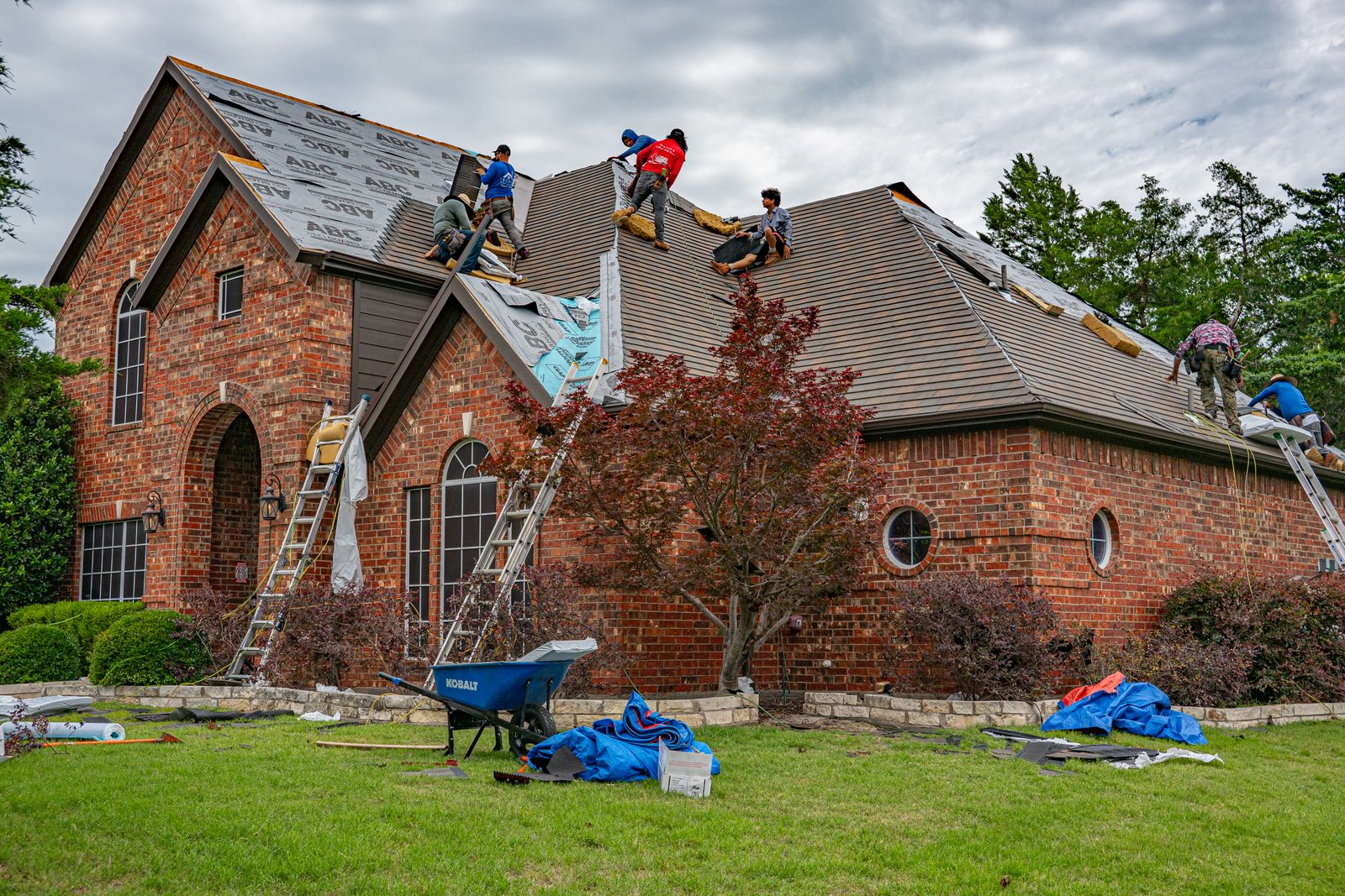 Roofing crew working on a local home